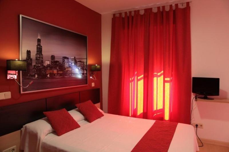 Cama o camas de una habitación en Hostal Falfes