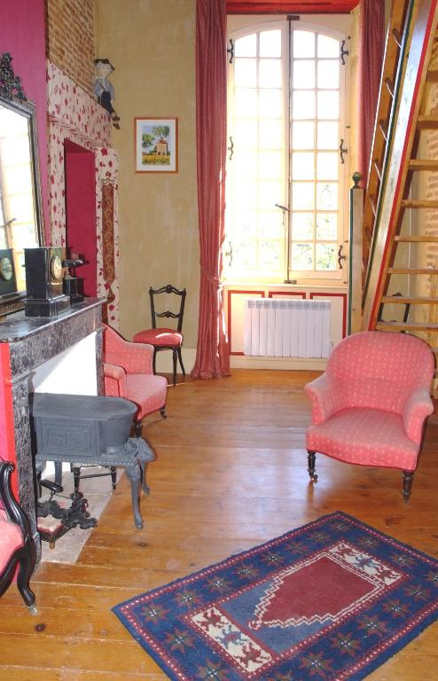 Posezení v ubytování Château de Vallègue