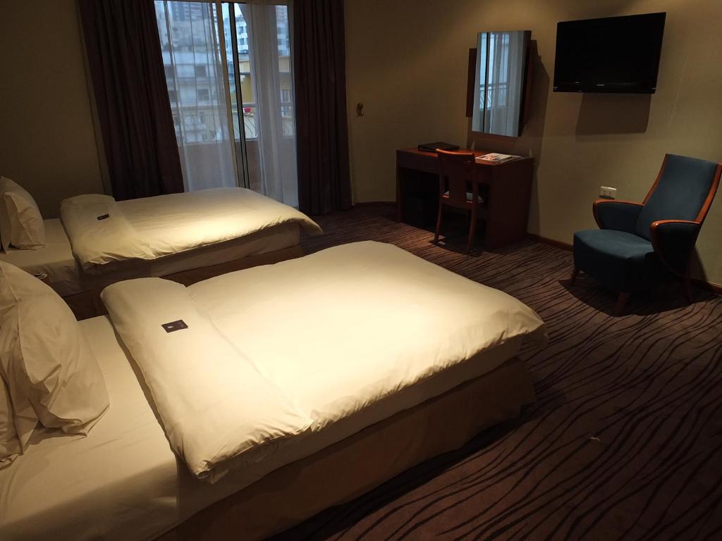 Postel nebo postele na pokoji v ubytování Plaza Hotel Beirut