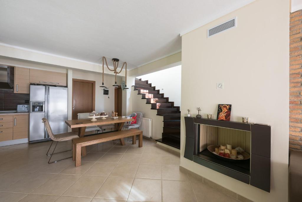 Kuchyň nebo kuchyňský kout v ubytování Elani Villa Dieci by Luxlikehome