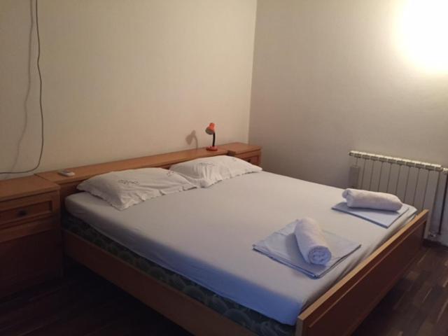 Postel nebo postele na pokoji v ubytování Rooms Ana