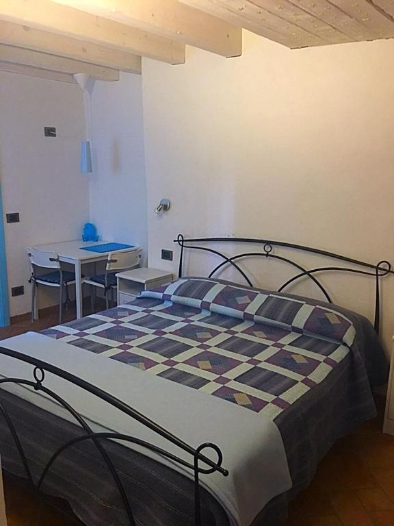 Postel nebo postele na pokoji v ubytování B&B El Piastrol