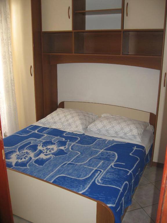 Postel nebo postele na pokoji v ubytování Apartments Selez