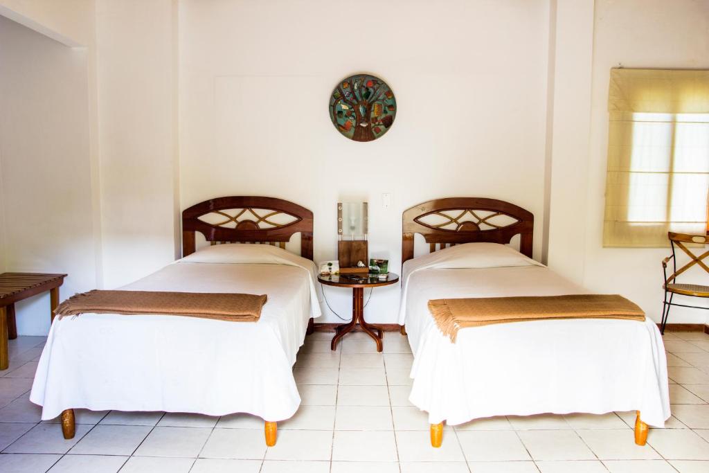 Postel nebo postele na pokoji v ubytování La Casa de Marita