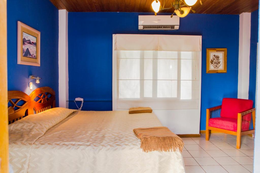 Postel nebo postele na pokoji v ubytování La Casa de Marita