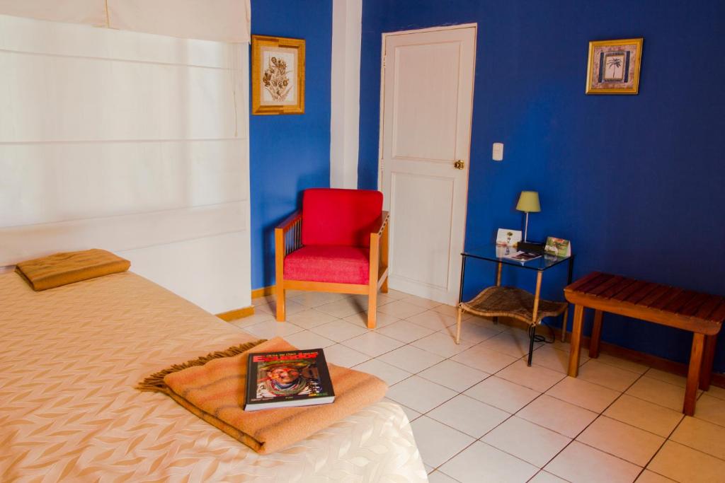 Postel nebo postele na pokoji v ubytování La Casa de Marita