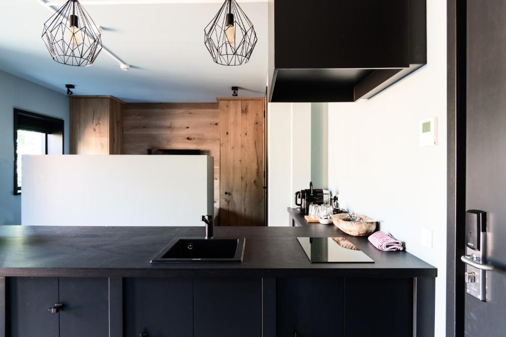 Kuchyň nebo kuchyňský kout v ubytování Vesting Hotel Naarden