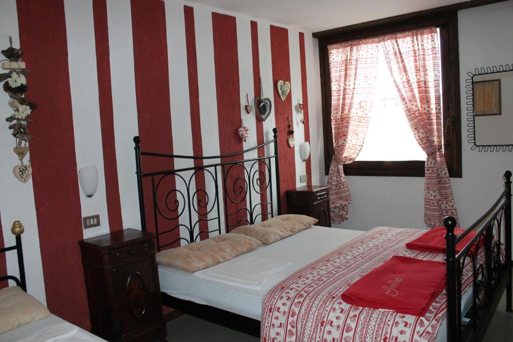 Una cama o camas en una habitación de Jolly Residence