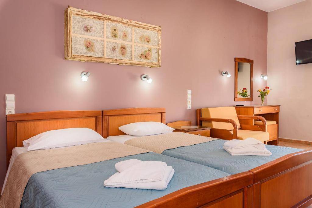 Postel nebo postele na pokoji v ubytování Irinoula Dreams
