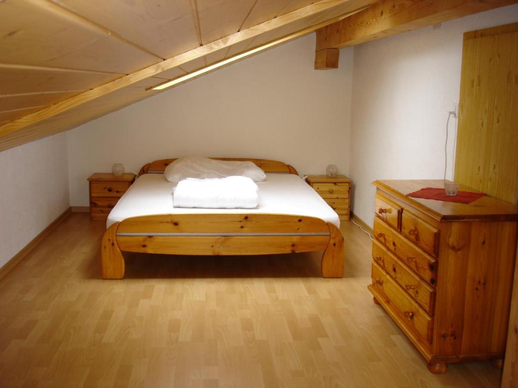 Postel nebo postele na pokoji v ubytování Chalet Sunneschyn