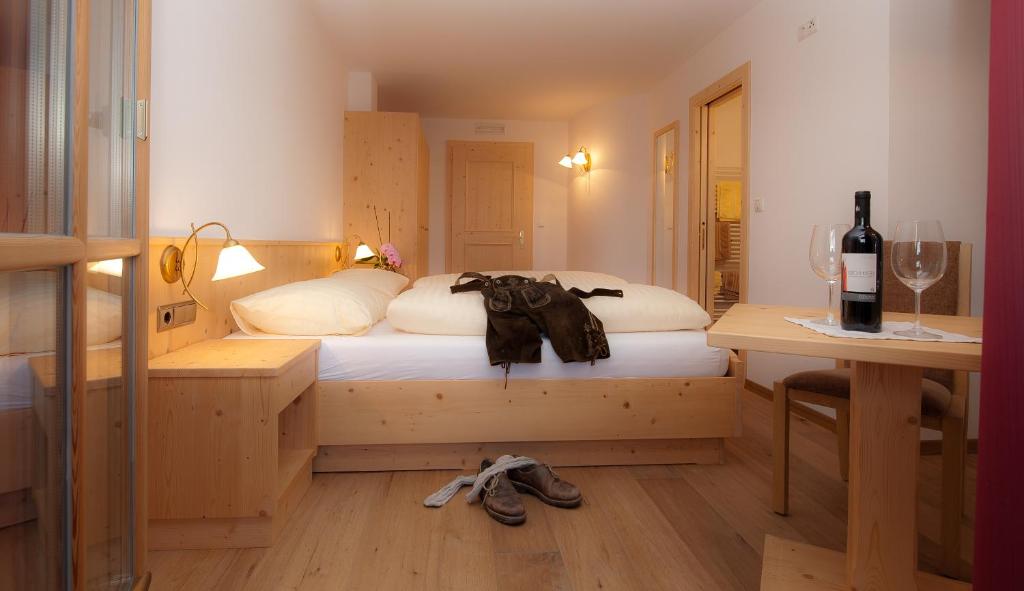 Postel nebo postele na pokoji v ubytování Gasthaus Bad Siess