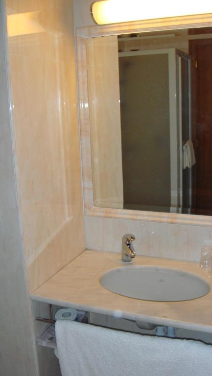 Koupelna v ubytování Albergo Corona