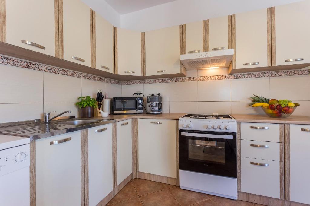 Kuchyň nebo kuchyňský kout v ubytování Casa Istriana Pula