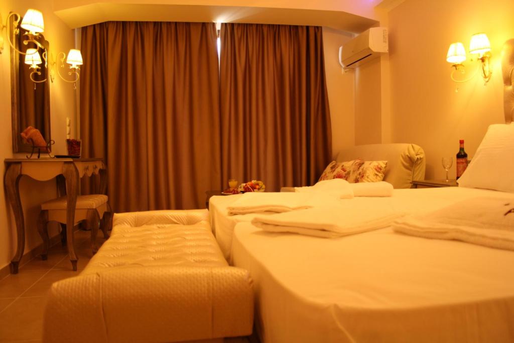 Postel nebo postele na pokoji v ubytování Palatino Hotel