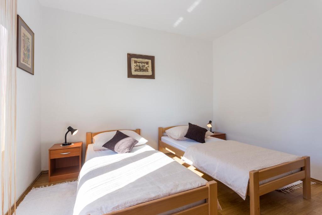 Postel nebo postele na pokoji v ubytování Casa Istriana Pula