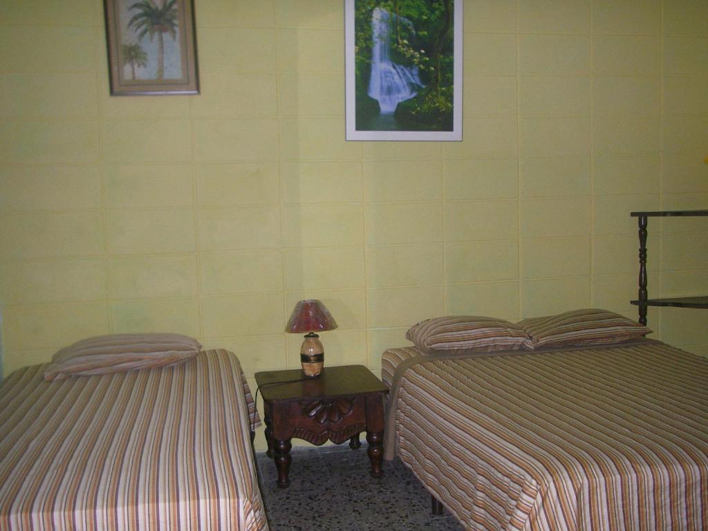 Postel nebo postele na pokoji v ubytování Guesthouse Dos Molinos B&B