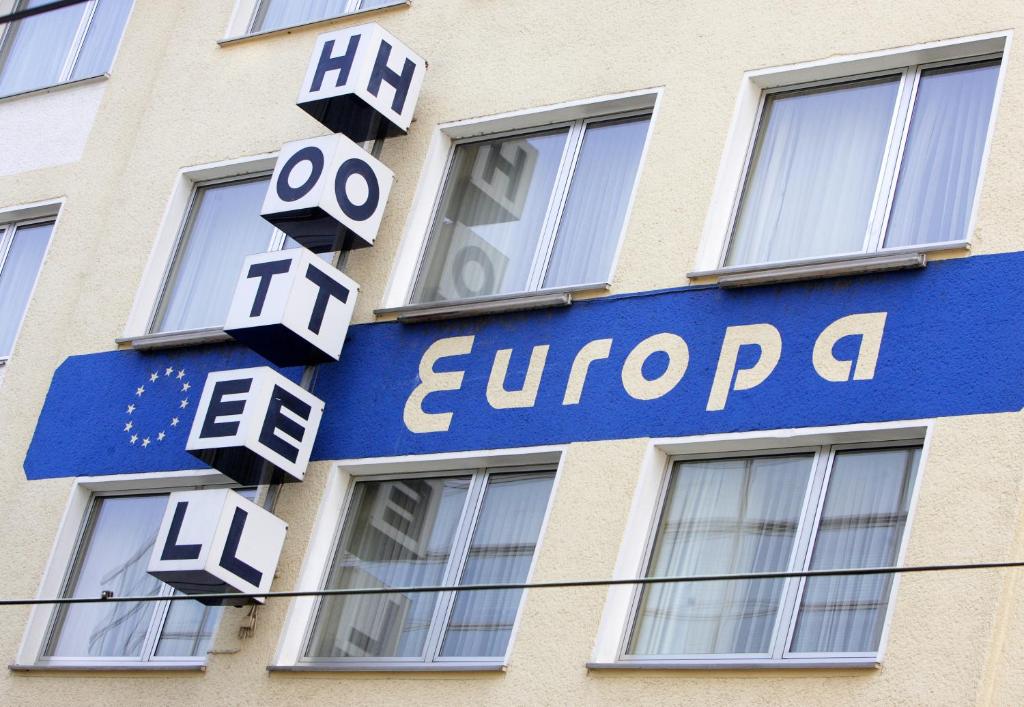a sign on the side of a building at Hotel Europa in Bonn