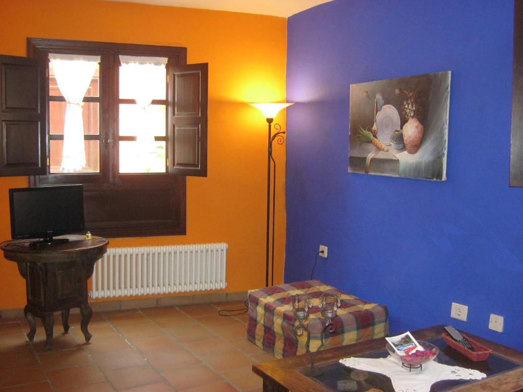 TV a/nebo společenská místnost v ubytování Casa Ida