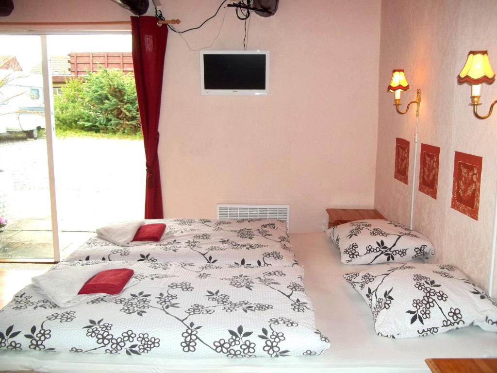 Postel nebo postele na pokoji v ubytování Bed and Breakfast Vester Hjermitslev