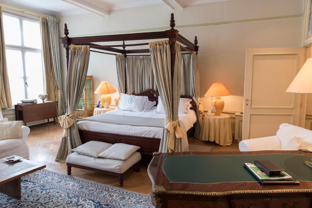 Postel nebo postele na pokoji v ubytování Hotel Le Dixseptième