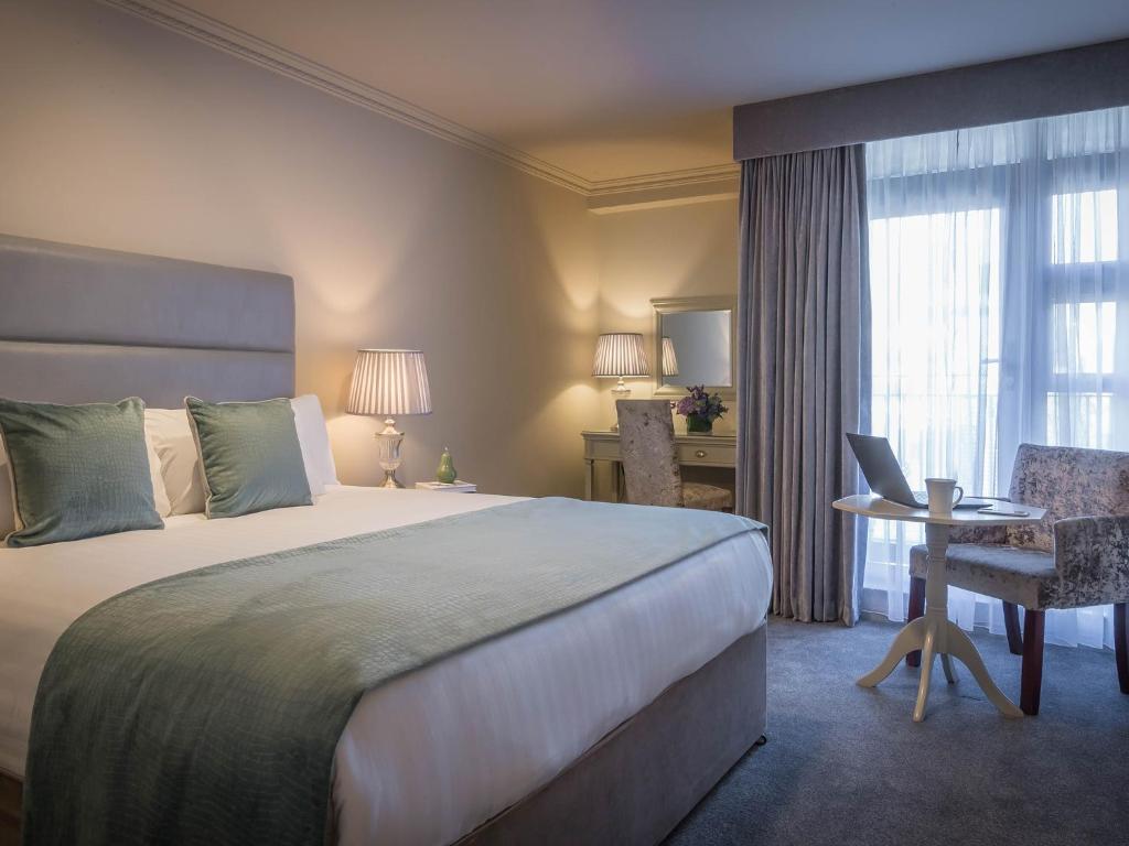 Postel nebo postele na pokoji v ubytování HYDE Hotel