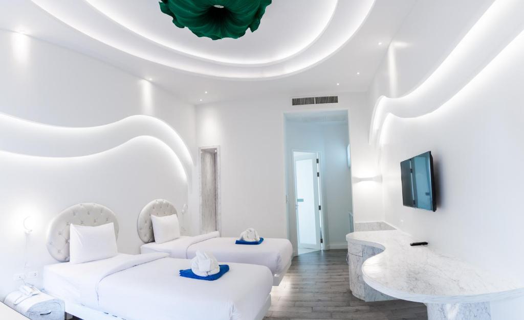 Postel nebo postele na pokoji v ubytování Avatara Resort