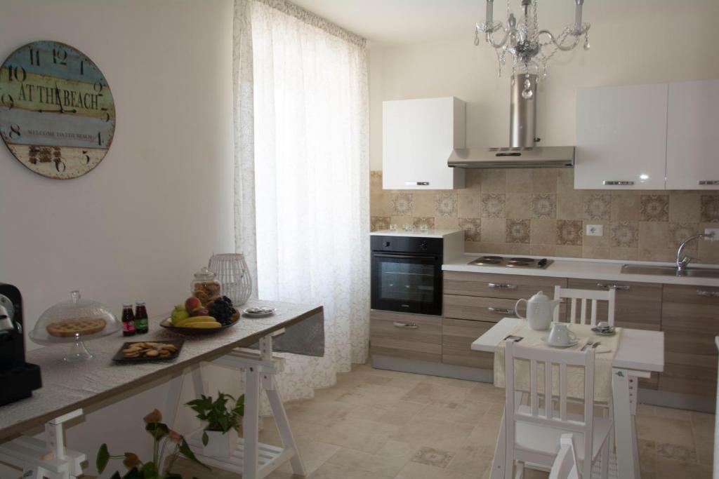 Kuchyň nebo kuchyňský kout v ubytování B&B Armonia