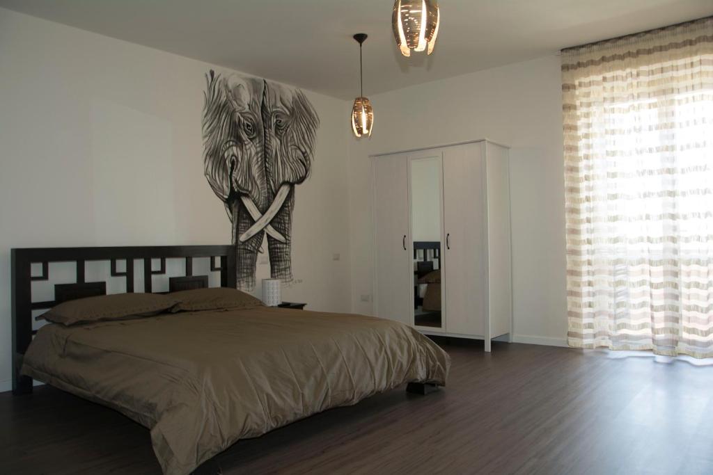Postel nebo postele na pokoji v ubytování B&B Armonia