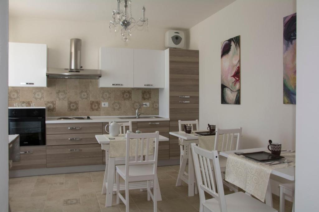 Kuchyň nebo kuchyňský kout v ubytování B&B Armonia
