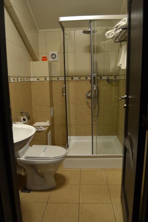 Koupelna v ubytování Hotel Athos