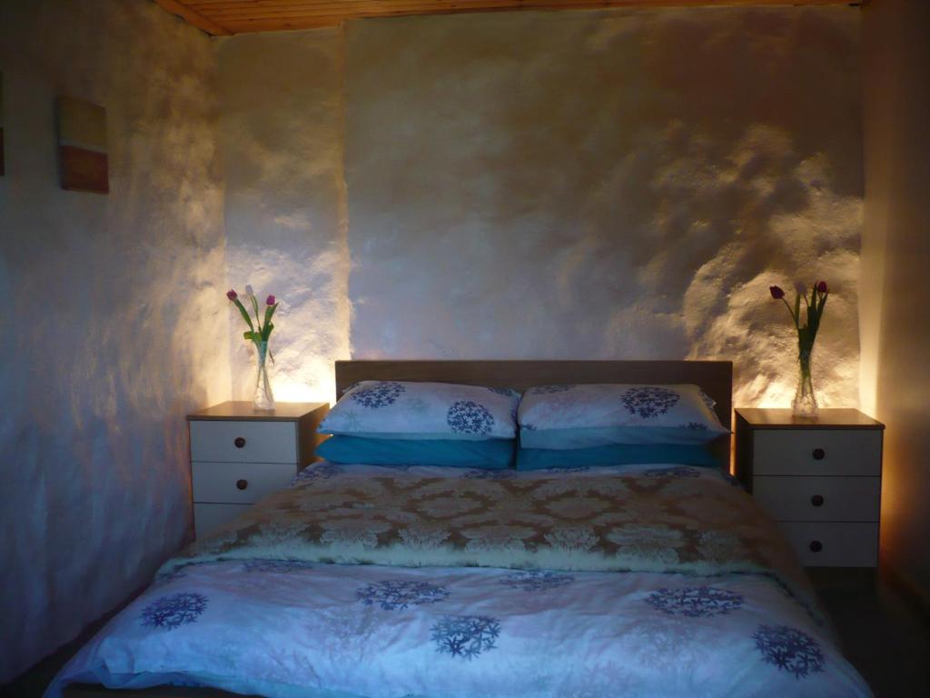 Postel nebo postele na pokoji v ubytování Glas Bheinn Cottage