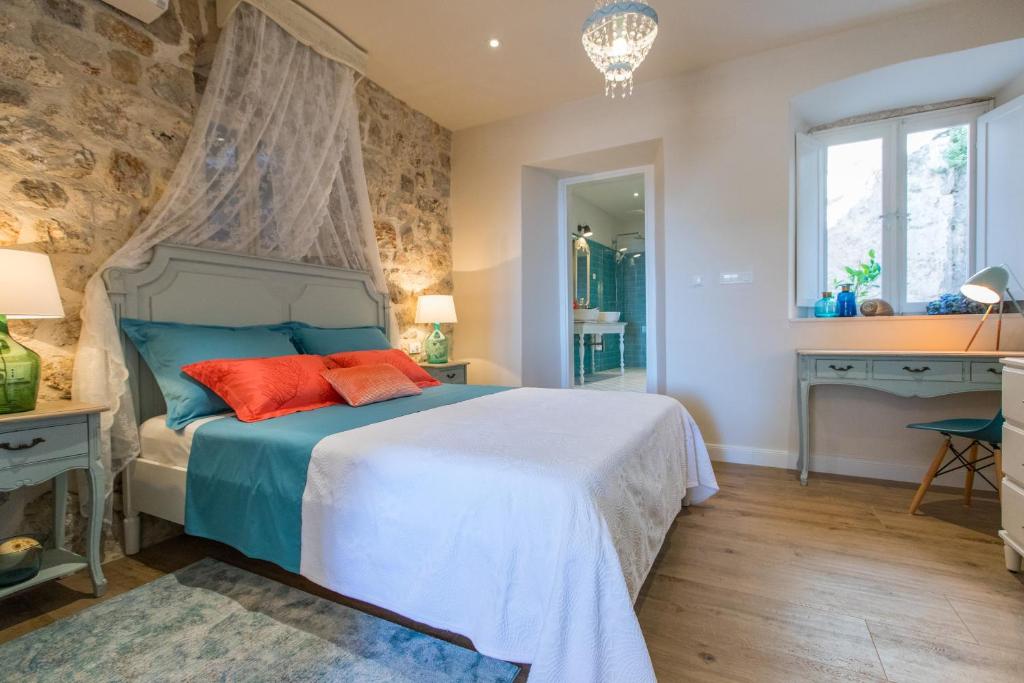 Posteľ alebo postele v izbe v ubytovaní Villa Ani apartment Aquamarine