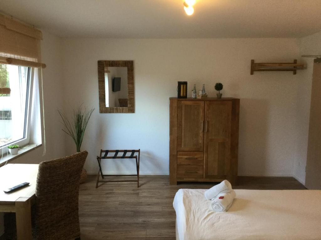Postel nebo postele na pokoji v ubytování Hotel Zum Alten Schlagbaum