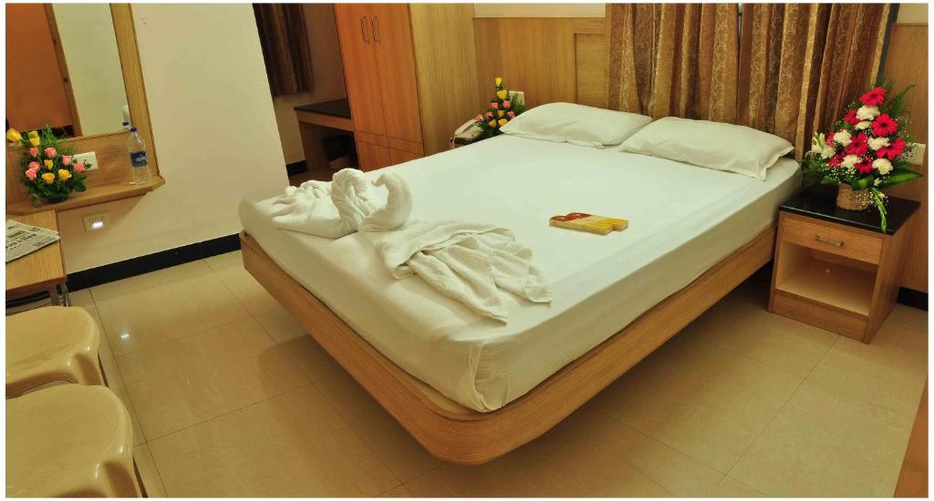 Postel nebo postele na pokoji v ubytování SK Residency