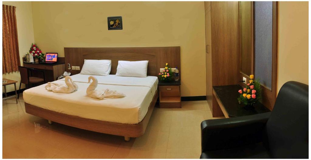 Postel nebo postele na pokoji v ubytování SK Residency