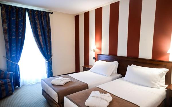 Posteľ alebo postele v izbe v ubytovaní Relais Santo Stefano