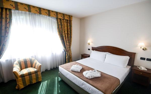 Posteľ alebo postele v izbe v ubytovaní Relais Santo Stefano