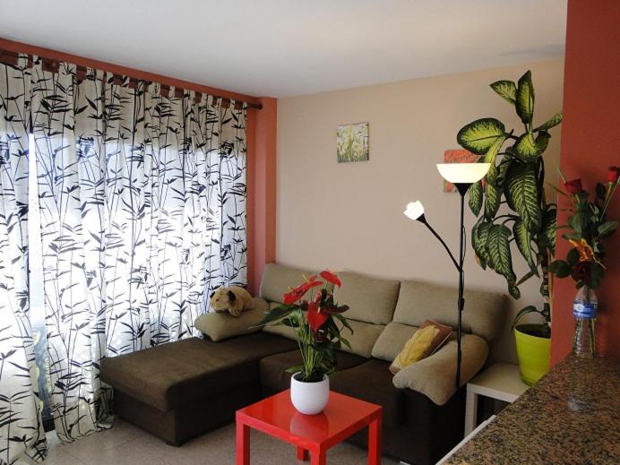 A seating area at Ático Louis Braille