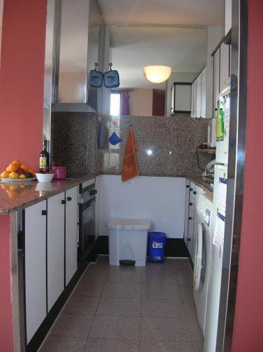 A kitchen or kitchenette at Ático Louis Braille
