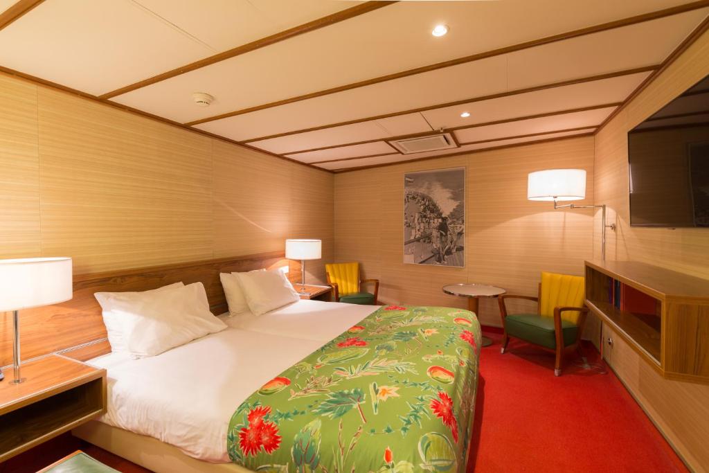 Letto o letti in una camera di ss Rotterdam by WestCord
