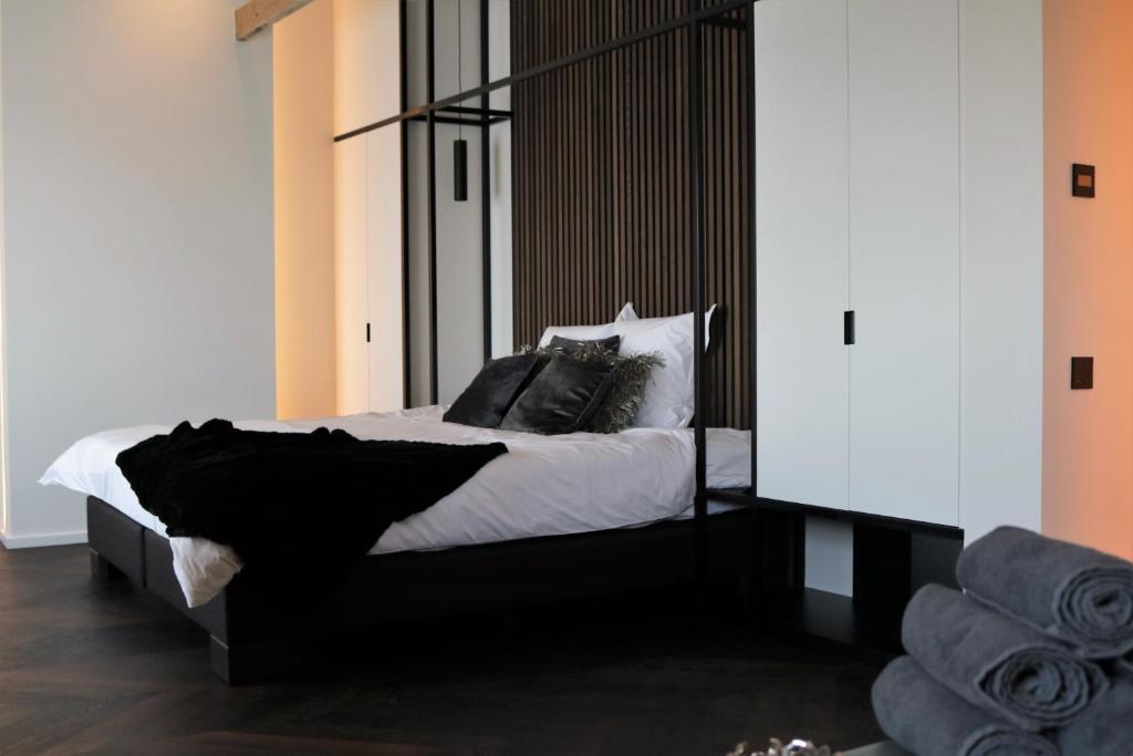 Postel nebo postele na pokoji v ubytování B&B For 2-Wellness For 2