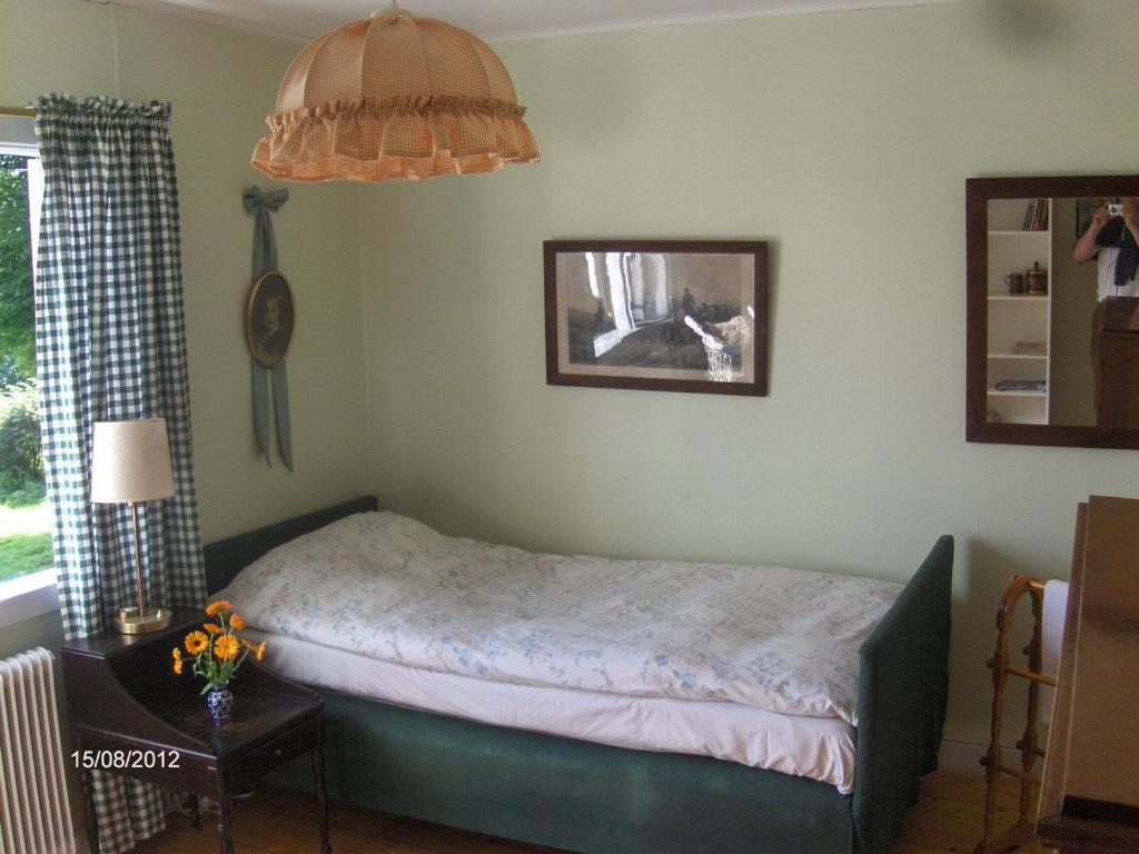 Postel nebo postele na pokoji v ubytování Mälby Säteri B&B