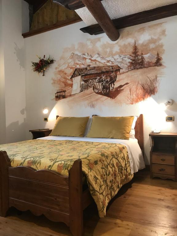 Łóżko lub łóżka w pokoju w obiekcie Chalet Chez Nous