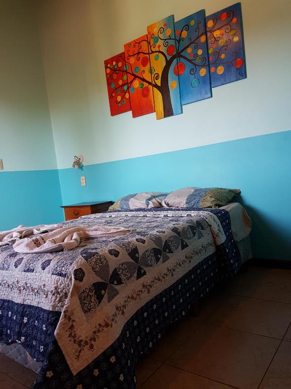 Postel nebo postele na pokoji v ubytování Hostel Iguazu Falls