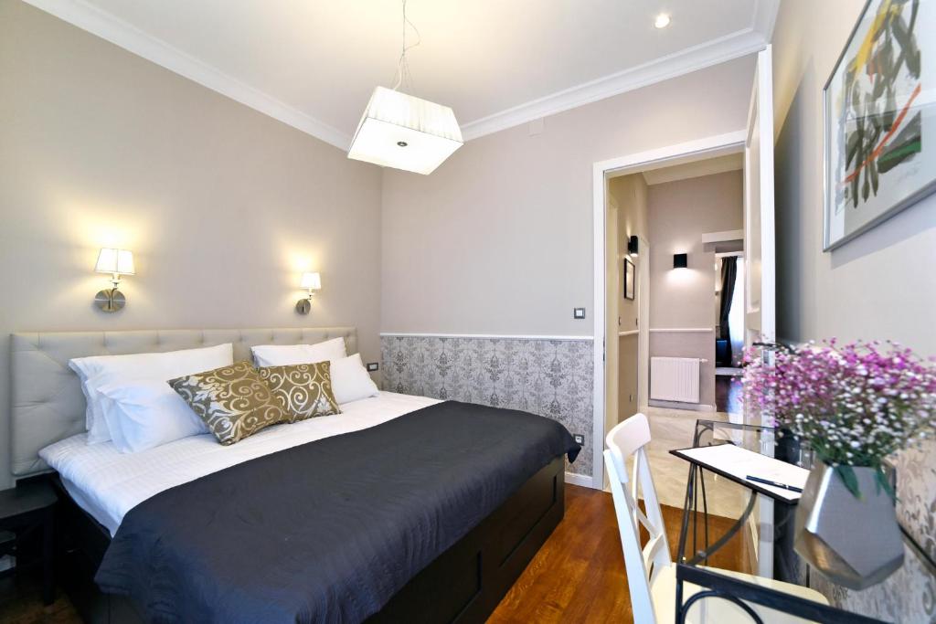 Posteľ alebo postele v izbe v ubytovaní Markiz Luxury Apartments