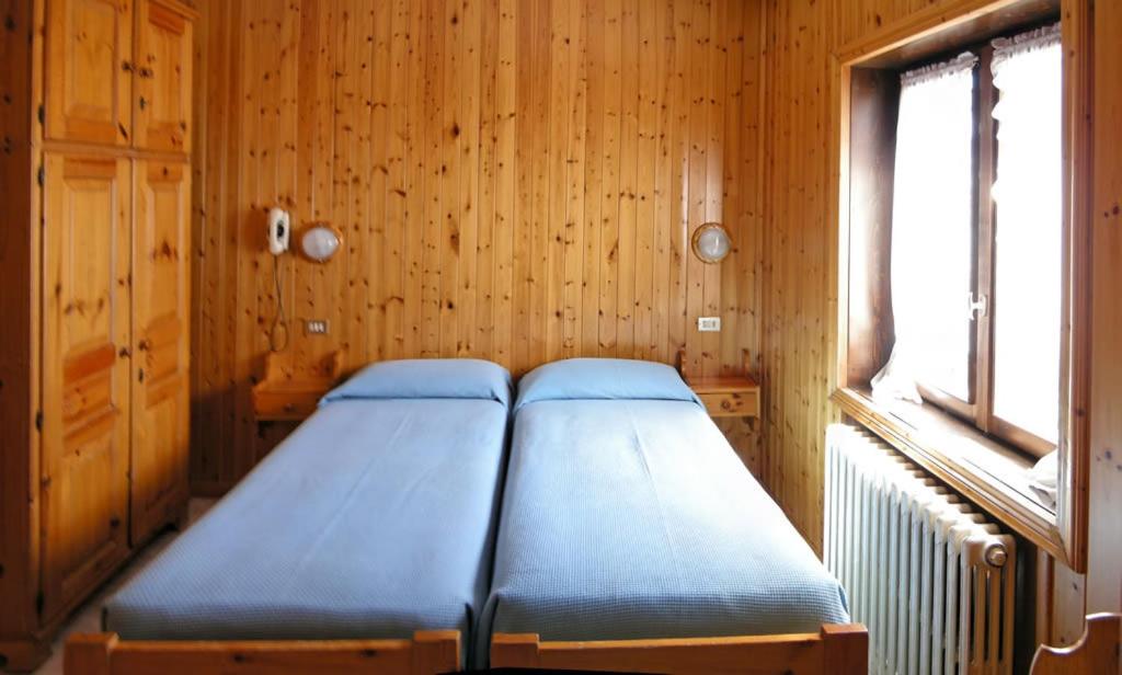 Postel nebo postele na pokoji v ubytování Hotel Federia