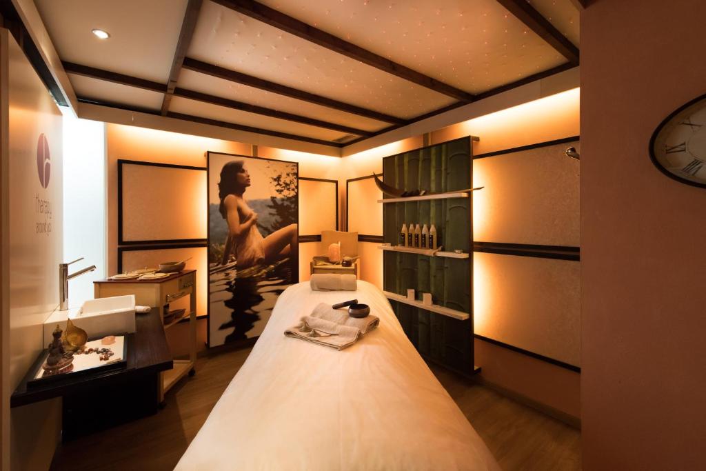 Postel nebo postele na pokoji v ubytování Hotel Patrizia Dolomites Glamour