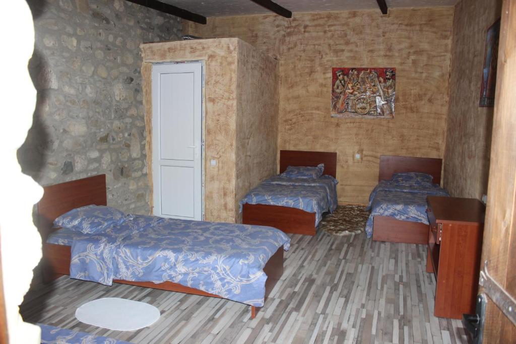 Postel nebo postele na pokoji v ubytování Golden Cradle