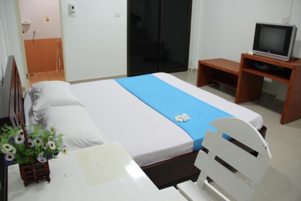 TV a/nebo společenská místnost v ubytování Thai Guesthouse