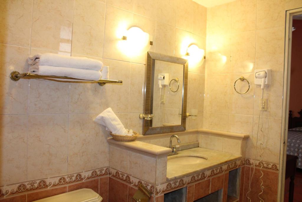 Koupelna v ubytování Hotel Posada Doña Lala
